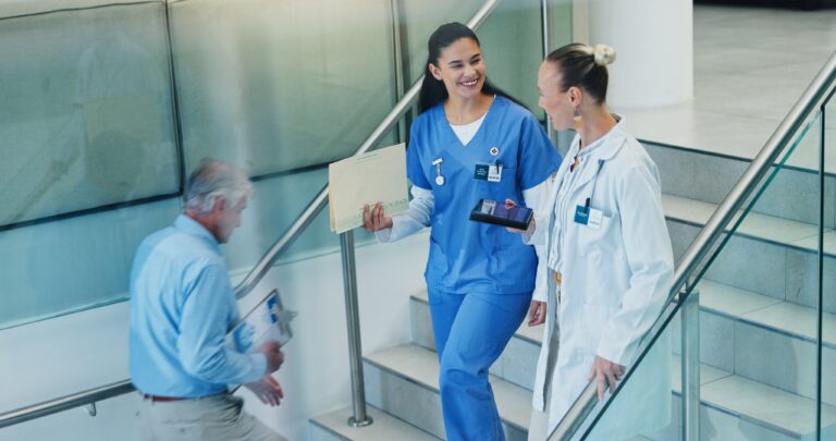 People,,Stairs,And,Doctors,In,Hospital,,Conversation,And,Smile,With